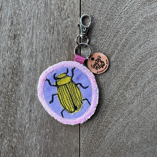 Purple and Green Doodle Bug Keychain