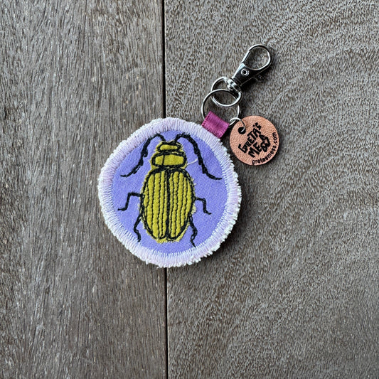 Purple and Green Doodle Bug Keychain